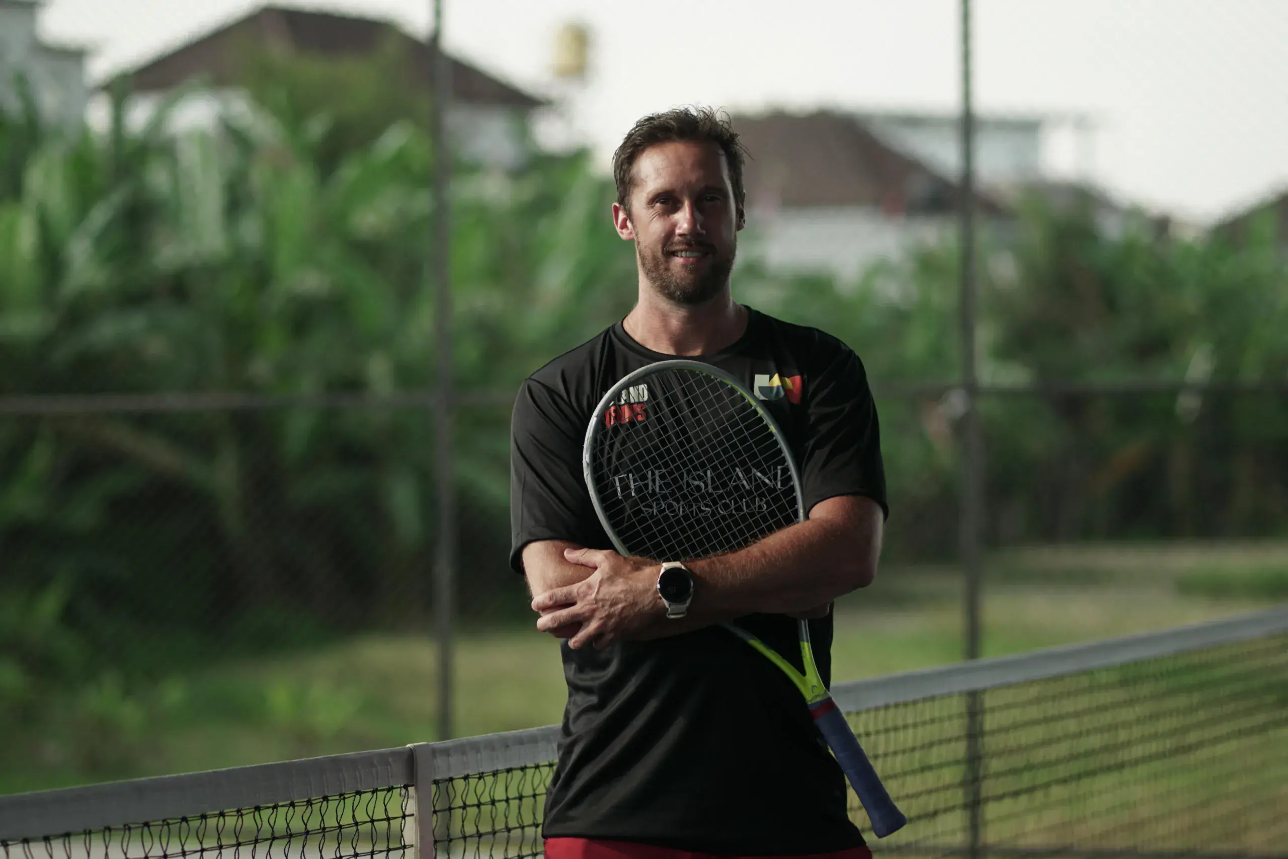 Island Sports Club - Tennis Coach - Rhod